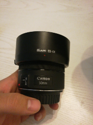 出佳能99新50mm1.8stm二代小痰盂